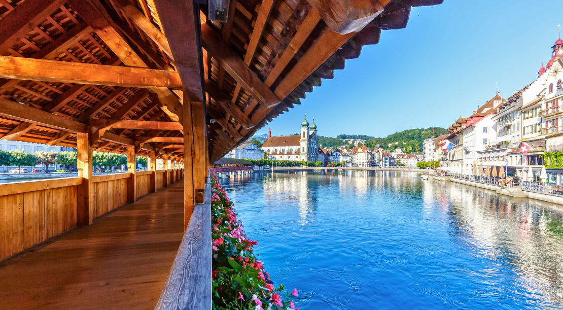 Discover and Roam - Things to Do in Lucerne - Cross the Historic Kapellbrücke - Slider